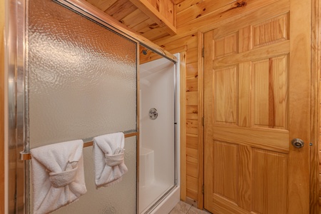 Bathroom with a shower at Hickernut Lodge, a 5-bedroom cabin rental located in Pigeon Forge