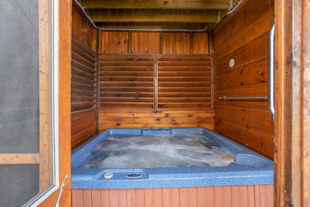 Enclosed hot tub for privacy at Bear Country, a 3-bedroom cabin rental located in Pigeon Forge