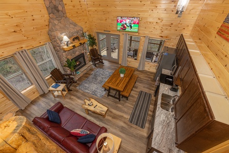 Looking down at the living room at Poolin Around, a 2 bedroom cabin rental located in Gatlinburg