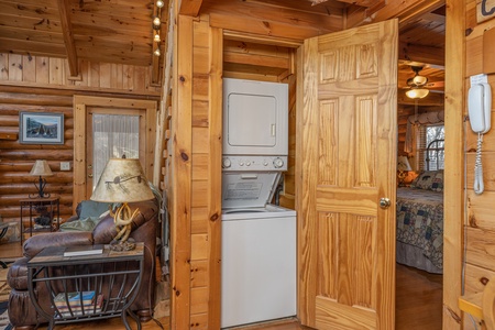 Stacked washer and dryer at A Lover's Secret, a 1 bedroom cabin rental located in Gatlinburg