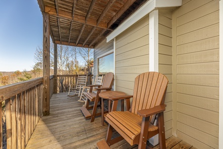 Adirondack chairs on the deck at Le Bear Chalet, a 7 bedroom cabin rental located in Gatlinburg