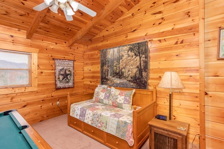 Trundle bed in the loft space at Enchanted Evening, a 1-bedroom cabin rental located in Pigeon Forge