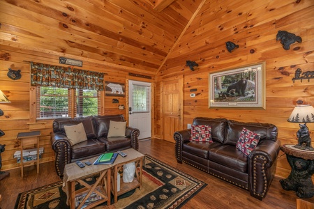 Two loveseats in the living room at Southern Charm, a 2 bedroom cabin rental located in Pigeon Forge