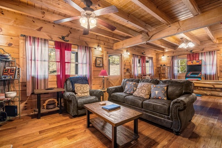 Living room Seating with a couch and chair at A Beary Nice Cabin, a 2 bedroom cabin rental located in Pigeon Forge
