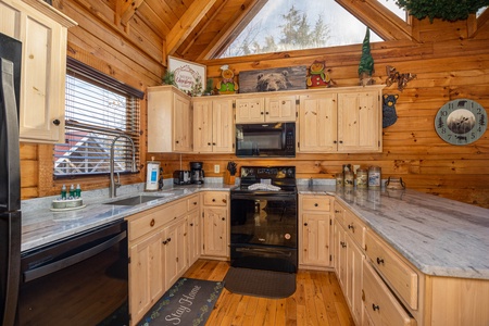 Kitchen appliances at Bear Feet Retreat, a 1 bedroom cabin rental located in pigeon forge