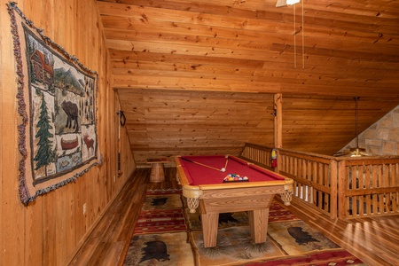 Pool table in the loft at Papa Bear, a 3 bedroom cabin rental located in Pigeon Forge