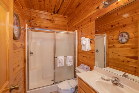 Bathroom with a shower at Hickernut Lodge, a 5-bedroom cabin rental located in Pigeon Forge