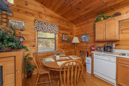 Dining table for 4 at A Cheerful Heart, a 2 bedroom cabin rental located in Pigeon Forge