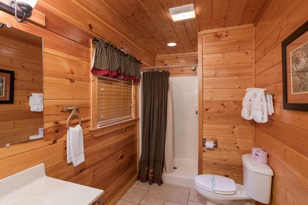 Bathroom with a shower at Kick Back & Relax! A 4 bedroom cabin rental located in Pigeon Forge