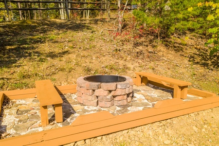 Fire pit at Lazy Bear Retreat, a 4 bedroom cabin rental located in Pigeon Forge