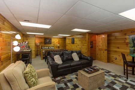 Lower level living room at Kelly's Cabin, a 1 bedroom cabin rental located in Pigeon Forge