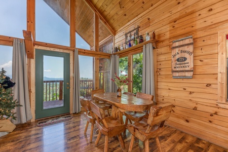 Dining area with seating for six at Away From it All, a 1 bedroom cabin rental located in Pigeon Forge