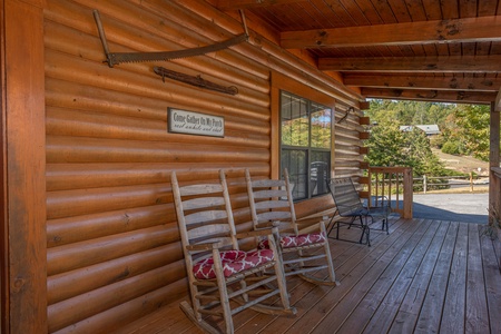 Porch with rocking chairs at Bearadise 4 Us, a 3 bedroom cabin rental located in Pigeon Forge