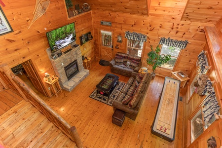Looking down into the living room at Misty Mountain Escape, a 2 bedroom cabin rental located in Gatlinburg
