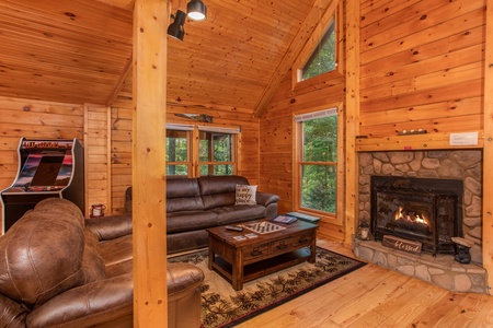 Fireplace in the living room at Lazy Mountain Retreat, a 1 bedroom cabin rental located in Gatlinburg