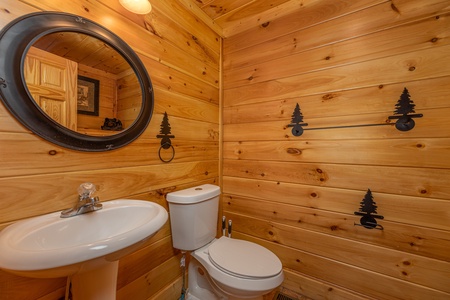 Half bath at Bears Don't Bluff, a 3 bedroom cabin rental located in Pigeon Forge