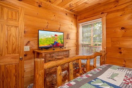 Main floor bedroom amenities at American Dream, a 2 bedroom cabin rental located in Gatlinburg