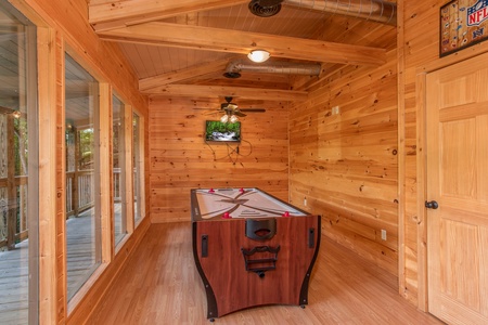 Convertible pool table to air hockey table at License to Chill, a 3 bedroom cabin rental located in Gatlinburg