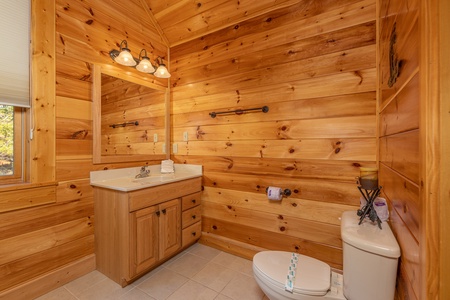 Vanity and toilet in a bathroom at Sensational Views, a 3 bedroom cabin rental located in Gatlinburg