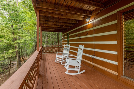 Deck rocking chairs at Copper Owl, a 2 bedroom cabin rental located in Pigeon Forge