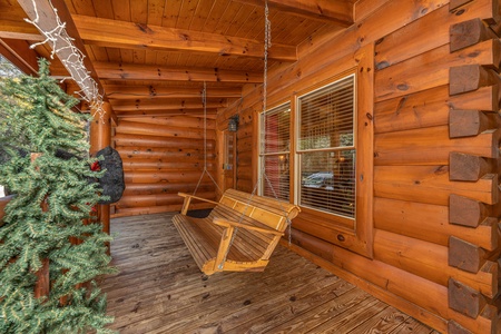 Porch swing at Bears Don't Bluff, a 3 bedroom cabin rental located in Pigeon Forge