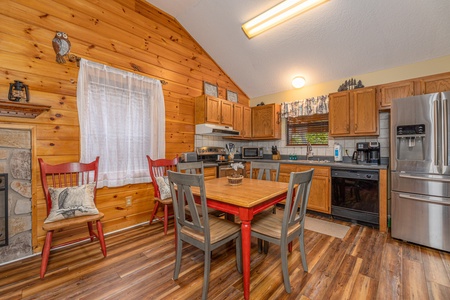 Dining table for 4 at Copper Owl, a 2 bedroom cabin rental located in Pigeon Forge