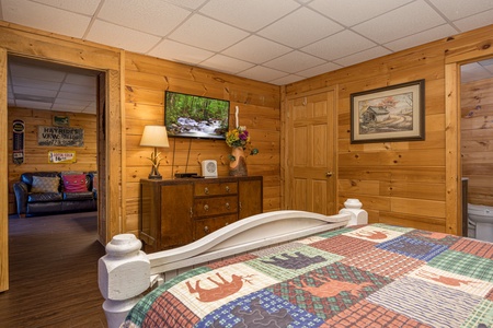 Bedroom by game room at Fox Ridge, a 3 bedroom cabin rental located in Pigeon Forge