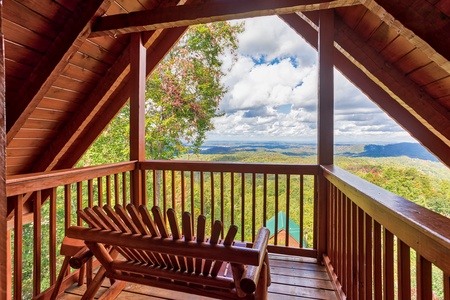 Top deck with bench and view at Ella-Vation, a 3 bedroom cabin rental located in Gatlinburg