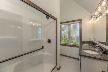 Bathroom with walk in shower at Mountain Celebration, a 4 bedroom cabin rental located in Gatlinburg