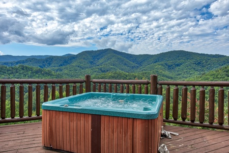 Hot tub on a deck at Majestic Views, a 3 bedroom cabin rental located in Pigeon Forge