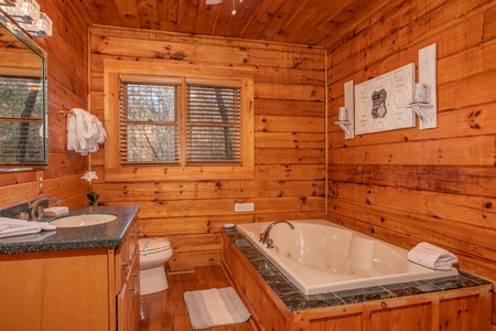 Jacuzzi tub in the bathroom at The Original American Dream, a 2 bedroom cabin rental located in Gatlinburg