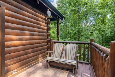Loveseat rocking chair at A Bear on the Ridge, a 2 bedroom cabin rental located in Pigeon Forge