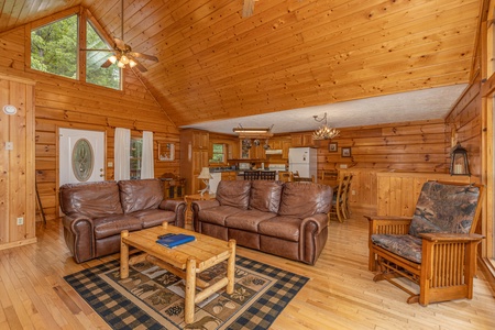 Living room with dining and kitchen attached at Wildlife Retreat, a 3 bedroom cabin rental located in Pigeon Forge