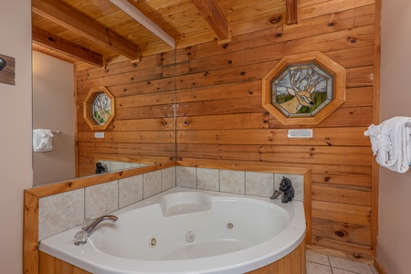 Jacuzzi tub in a bathroom at Almost Bearadise, a 4 bedroom cabin rental located in Pigeon Forge