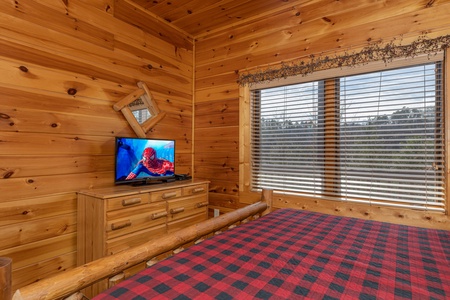 Flat Screen in bedroom at Mountain Mama, a 3 bedroom cabin rental located in pigeon forge