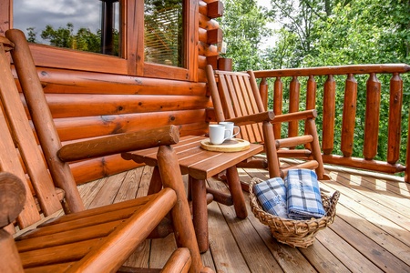 Rocking chairs on the deck at Eagle's Sunrise, a 2 bedroom cabin rental located in Pigeon Forge