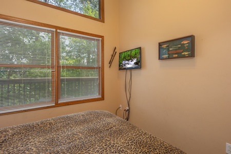 TV in the loft bedroom at Amazing Memories, a 3 bedroom cabin rental located in Pigeon Forge