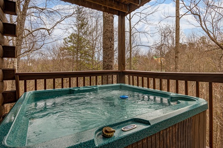 Hot tub at Moonlight in the Boondocks, a 2 bedroom cabin rental located in Gatlinburg