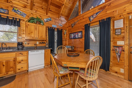 Dining table for 4 at Nascar Nation, a 2 bedroom cabin rental located in Pigeon Forge