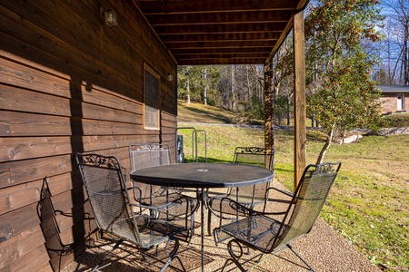 Outdoor seating on covered patio at Rocky Top Ridge Views