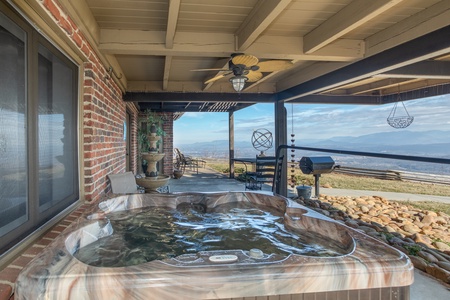 Hot tub with views of Pigeon Forge at Best View Ever! A 5 bedroom cabin rental in Pigeon Forge