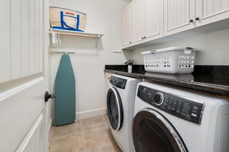 Your dedicated laundry room makes extended stays effortless with premium washer, dryer, and thoughtful storage for all your travel essentials.