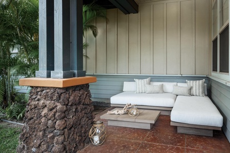 Relax on your private covered patio with plush seating and tropical views, perfect for morning coffee or evening cocktails.