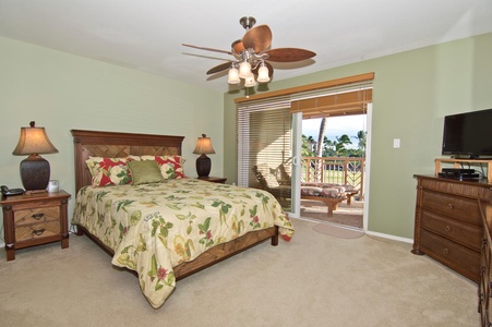 - Relax in a cozy bedroom with tropical bedding, soft pillows, and calming green walls   - Step outside to your outdoor space offering serene palm views and fresh air   - Natural light and gentle ocean breezes flow through sliding glass doors