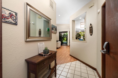 Step into your welcoming entryway where warm touches and thoughtful details create an inviting first impression of your home away from home.