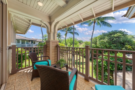 Step onto your private covered balcony and sink into comfortable wicker seating while enjoying tropical garden views and swaying palms.