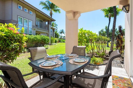 Covered lanai with tropical landscaping