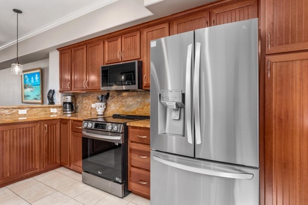 Your fully equipped kitchen features beautiful wood cabinetry, granite countertops, and stainless steel appliances for all your culinary adventures.