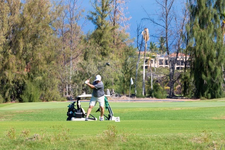 Enjoy a round of golf with stunning island views.