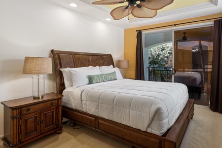 Sliding glass door opens to a private balcony lanai.